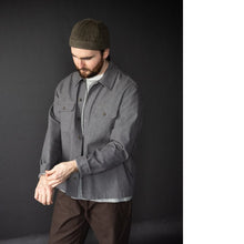Load image into Gallery viewer, Male wears a think Arbor Jacket playing at the long sleeve cuff turned up