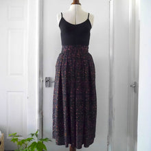 Load image into Gallery viewer, Mannequin displays the Merchant & Mills Shepherd Skirt made using Atelier Brunette's Candy Rock Tender Toffee Viscose Modal fabric