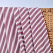 Load image into Gallery viewer, Close up of Stripe Sunray Viscose Modal fabric draped over wicker chair