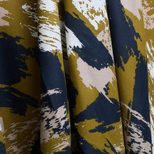 Load image into Gallery viewer, Atelier Brunette's Mira Viscose fabric hangs to show drape close-up, with an abstract brushstrokes pattern print