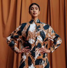 Load image into Gallery viewer, Model wears a button up shirt dress, made in Atelier Brunette's Mira Viscose fabric