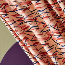 Load image into Gallery viewer, Diagonal view of Viscose Twill fabric hanging with heavy drape
