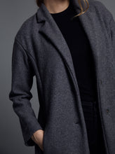 Load image into Gallery viewer, Close up detail of coat worn open with 2 buttons at front