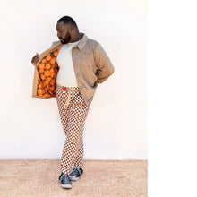 Load image into Gallery viewer, Male wears a Beachcomber jacket, lined in pattern fabric