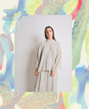 Load image into Gallery viewer, Lady wears a long sleeved, high neck Zero Waste Top