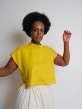 Load image into Gallery viewer, Lady wears a short sleeved, cropped, high neck Zero Waste Top