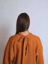 Load image into Gallery viewer, Back view of lady wearing Zero Waste Dress with ties at neck