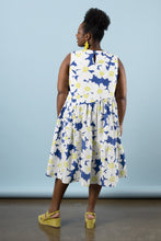Load image into Gallery viewer, Back view of model wearing Azure dress: a sleeveless top, with asymmetric above knee length skirt