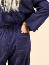Load image into Gallery viewer, Back pants detail shows patch pocket on right bottom