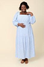 Load image into Gallery viewer, Model wears the Pauline Dress; a square neckline, long puff sleeves, maxi skirt including a gathered panel at above-knee level