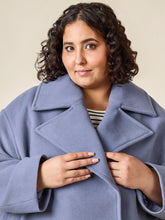 Load image into Gallery viewer, Close up of dramatic, notched collar lapel on coat