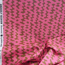 Load image into Gallery viewer, Modal Fabric draped with squiggly print pattern