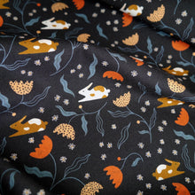 Load image into Gallery viewer, Organic cotton fabric with bunnies amongst flower stems pattern print