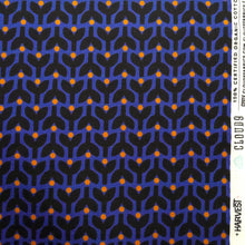 Load image into Gallery viewer, Organic cotton fabric displayed flat shows print of stems and dots in tessellating pattern