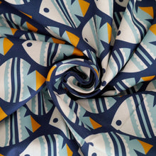 Load image into Gallery viewer, Cloud9 Fabrics Organic Cotton with fish print displayed with central swirl