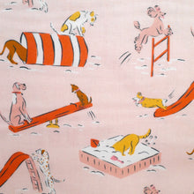 Load image into Gallery viewer, Close up of cartoon dogs playing on playground apparatus, print on cotton fabric