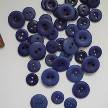 Load image into Gallery viewer, Scatter of 2-hole corozo buttons in two different sizes