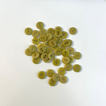 Load image into Gallery viewer, Pile of 2 hole buttons on a plain background