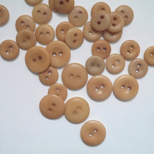 Load image into Gallery viewer, Scatter of 2-hole corozo buttons in two different sizes