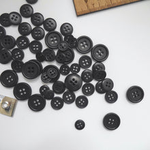 Load image into Gallery viewer, Scattering of 4-hole corozo buttons in three different sizes