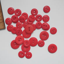 Load image into Gallery viewer, Scatter of 2-hole corozo buttons in two different sizes