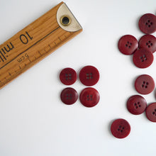 Load image into Gallery viewer, Four 4-hole buttons in 2 different sizes, shows one flat side, and one domed side