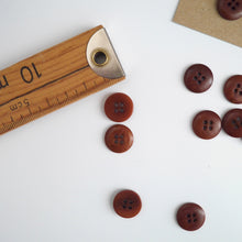 Load image into Gallery viewer, Two 4-hole buttons displayed, one with flat side, the other domed