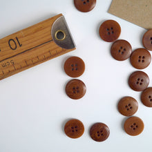 Load image into Gallery viewer, Two 4-hole buttons displayed, one with flat side, the other domed