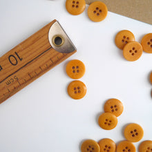 Load image into Gallery viewer, Two 4-hole buttons displayed, one with flat side, the other domed