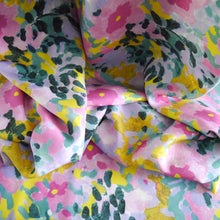 Load image into Gallery viewer, EcoVero viscose fabric hangs into a crumpled pile