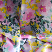 Load image into Gallery viewer, EcoVero viscose fabric with painted flowers print hangs