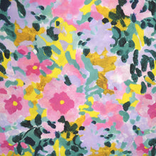 Load image into Gallery viewer, EcoVero viscose fabric with painted flowers print shown flat