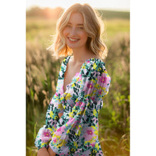 Load image into Gallery viewer, Lady wears cross over blouse made with Digital Flowers Print EcoVero Viscose Fabric