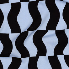 Load image into Gallery viewer, Close-up image of Eco Viscose fabric displayed flat, with graphic pattern of wavy vertical shapes