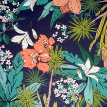 Load image into Gallery viewer, Cotton Lawn fabric with tropical floral pattern with flowers and green leaves on a dark background