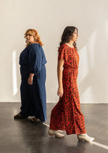 Load image into Gallery viewer, Two ladies wearing Avenir Jumpsuit walking away from one another