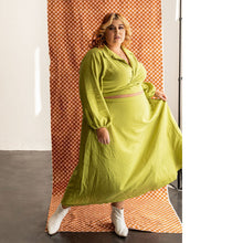 Load image into Gallery viewer, Lady wears the Saturday Skirt Set wrap top and midi skirt