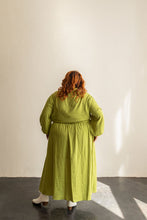 Load image into Gallery viewer, Back view of lady wearing the Saturday Skirt Set wrap top and midi skirt