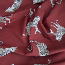 Load image into Gallery viewer, Cotton lawn fabric with leopards on displayed crumpled
