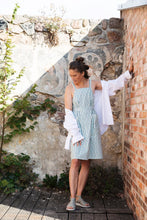 Load image into Gallery viewer, Lady wears apron dress in a stripe pattern fabric