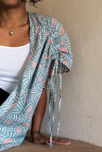 Load image into Gallery viewer, Close up shot of lady wearing an open shirt with gathered ties across drop front shoulder seam