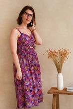 Load image into Gallery viewer, Lady stands against wall wearing strappy v-neck dress made up in Artifice Viscose fabric