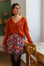Load image into Gallery viewer, Lady wears a short flared skirt made with Boreale viscose fabric