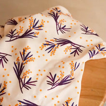 Load image into Gallery viewer, Viscose fabric with floral sprig print lays on table