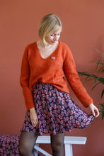 Load image into Gallery viewer, Lady wears a short skirt made up with Pashmina Viscose floral printed fabric