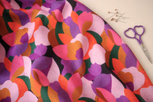 Load image into Gallery viewer, Lise Tailor Viscose fabric in a slight wave with petal pattern print, displayed next to pins and scissors
