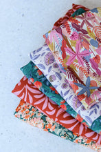 Load image into Gallery viewer, Five fabrics folded into squares, displayed fanned out to show their different designs