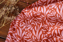 Load image into Gallery viewer, Viscose fabric shown with slight drape close up to show print of brushstroke petals