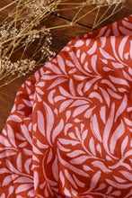 Load image into Gallery viewer, Viscose fabric shown with slight drape close up to show print of brushstroke petals