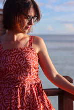 Load image into Gallery viewer, Lady leans on a fence wearing a thick strap bodice made up with the Lianes Viscose fabric